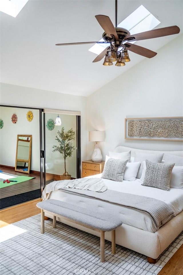 29111 Pompano Way, Laguna Niguel, CA 92677 - bedroom with light wood finished floors, a skylight, vaulted ceiling, and a ceiling fan