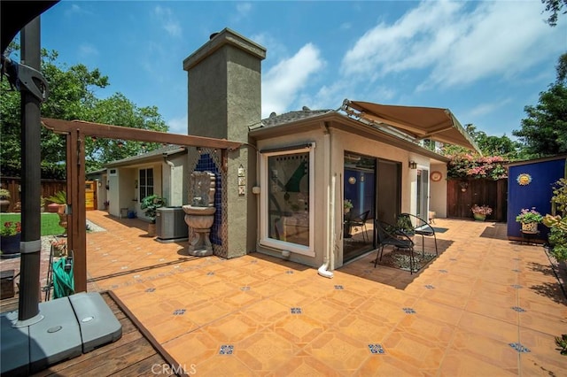 29111 Pompano Way, Laguna Niguel, CA 92677 - back of property with a chimney, stucco siding, and a patio area