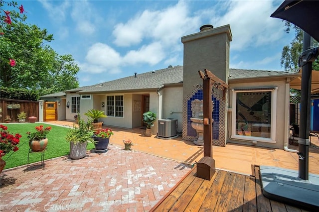 29111 Pompano Way, Laguna Niguel, CA 92677 - rear view of property with a chimney, stucco siding, a patio area, and a wooden deck