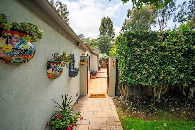 29111 Pompano Way, Laguna Niguel, CA 92677 - view of side of property featuring stucco siding and a gate