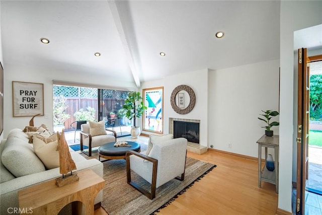 29111 Pompano Way, Laguna Niguel, CA 92677 - living area with light wood finished floors, healthy amount of natural light, recessed lighting, and a fireplace