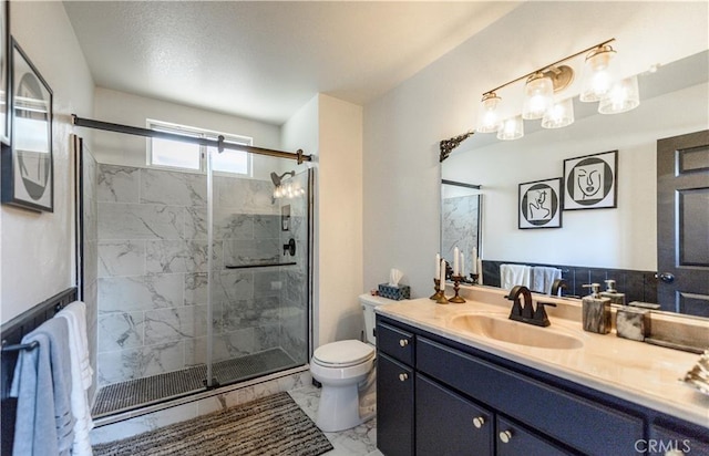 29148 Lyon Dr, Cedar Glen, CA 92321 - full bath featuring marble finish flooring, toilet, vanity, and a stall shower