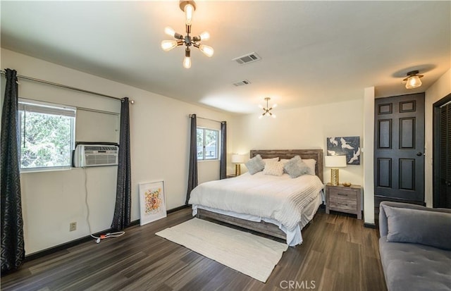 29148 Lyon Dr, Cedar Glen, CA 92321 - bedroom featuring a chandelier, dark wood finished floors, and baseboards