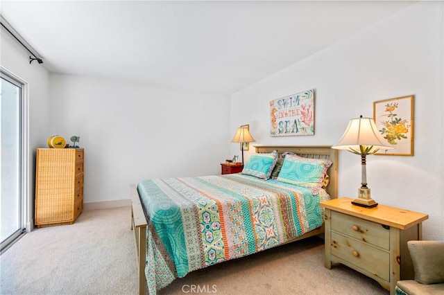 718 W 37th St Unit 4, San Pedro, CA 90731 - bedroom with light carpet, multiple windows, and baseboards