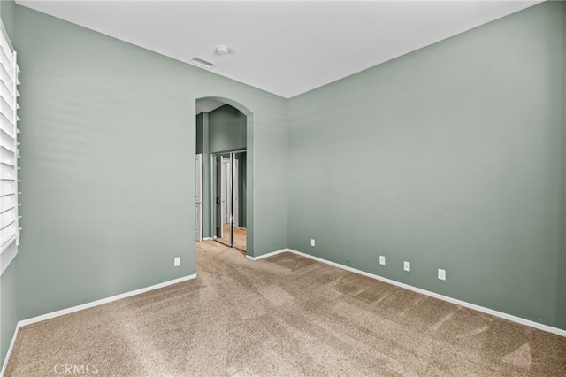 41799 Cascades Ct, Temecula, CA 92591 - carpeted spare room featuring arched walkways and baseboards