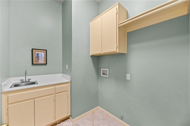 41799 Cascades Ct, Temecula, CA 92591 - washroom with cabinet space, washer hookup, baseboards, and tile patterned flooring