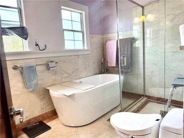 867 S Bronson Ave, Los Angeles, CA 90005 - full bathroom with tile walls, a bath, toilet, and a shower stall