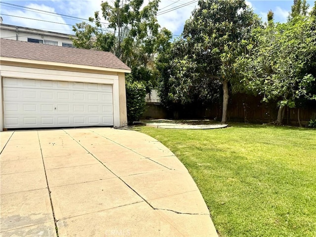 867 S Bronson Ave, Los Angeles, CA 90005 - view of yard featuring a garage