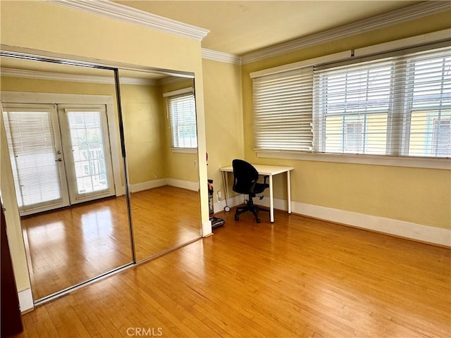 867 S Bronson Ave, Los Angeles, CA 90005 - office area with french doors, wood finished floors, crown molding, and baseboards