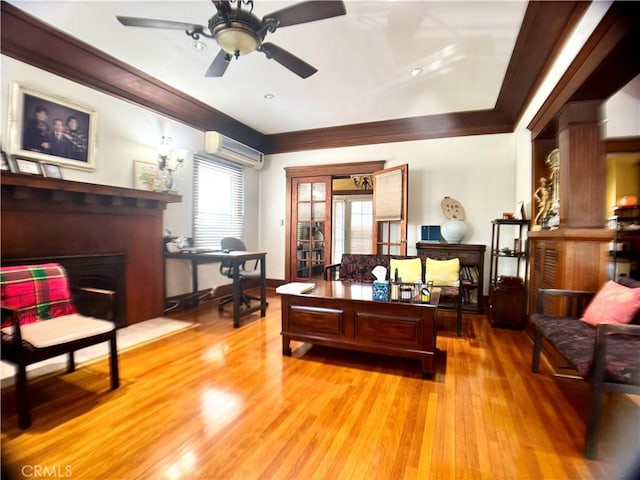 867 S Bronson Ave, Los Angeles, CA 90005 - office space featuring a wall unit AC, crown molding, ceiling fan, light wood-style flooring, and baseboards