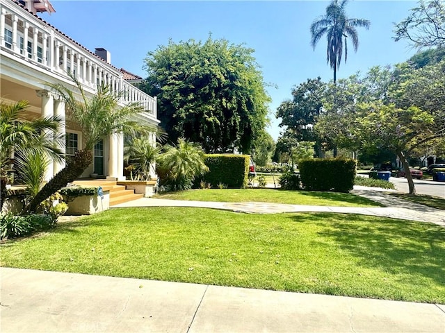 867 S Bronson Ave, Los Angeles, CA 90005 - view of green lawn with a balcony