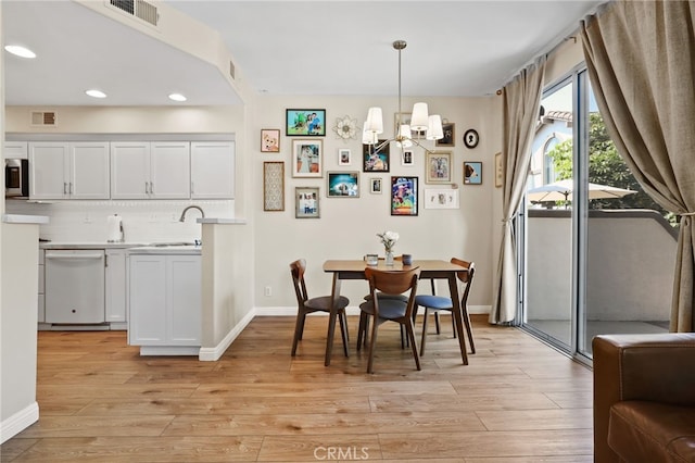 2348 Sunningdale Dr, Tustin, CA 92782 - dining area with recessed lighting, light wood-style floors, baseboards, and a chandelier