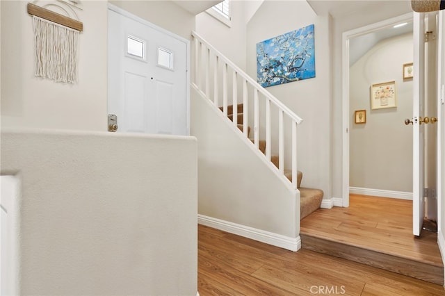 2348 Sunningdale Dr, Tustin, CA 92782 - staircase featuring wood finished floors and baseboards