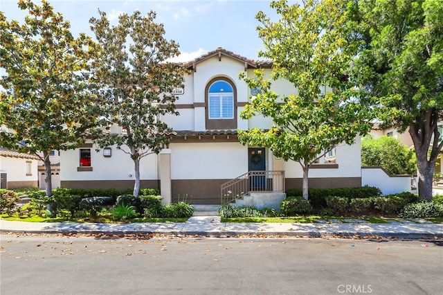 2348 Sunningdale Dr, Tustin, CA 92782 - mediterranean / spanish-style home with stucco siding and a tiled roof