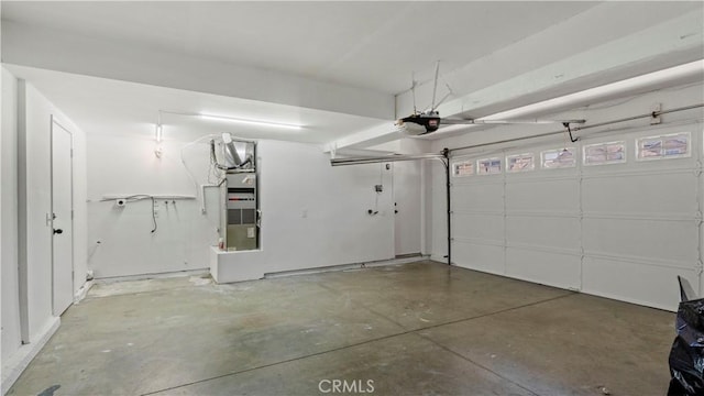 7059 Potenza Pl, Rancho Cucamonga, CA 91701 - garage featuring a garage door opener and heating unit