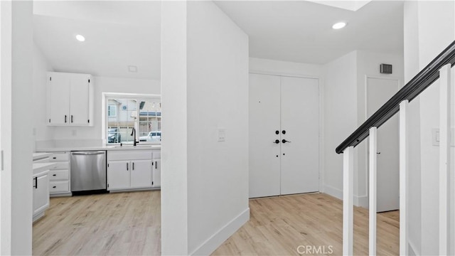 7059 Potenza Pl, Rancho Cucamonga, CA 91701 - foyer featuring light wood-style floors, baseboards, and recessed lighting