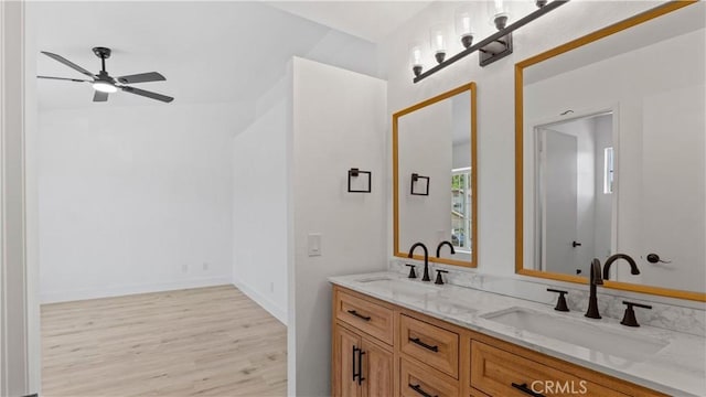 7059 Potenza Pl, Rancho Cucamonga, CA 91701 - full bathroom featuring double vanity, a ceiling fan, and wood finished floors