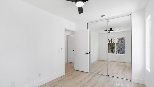 7059 Potenza Pl, Rancho Cucamonga, CA 91701 - unfurnished bedroom with wood finished floors, a closet, baseboards, and ceiling fan