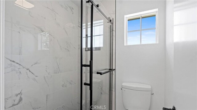 7059 Potenza Pl, Rancho Cucamonga, CA 91701 - full bath featuring a marble finish shower and toilet