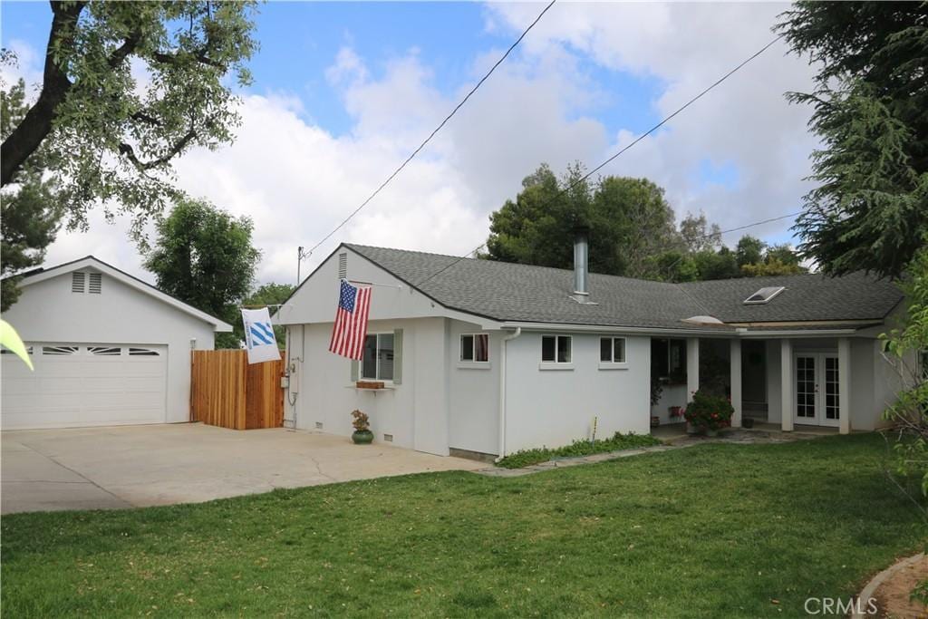 12644 Bryant St, Yucaipa, CA 92399 - ranch-style home featuring french doors, stucco siding, a garage, and roof with shingles