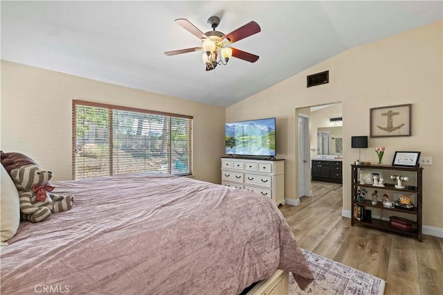28436 Calex Dr, Valencia, CA 91354 - bedroom featuring vaulted ceiling, light wood-style floors, ensuite bathroom, baseboards, and a ceiling fan