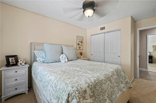 28436 Calex Dr, Valencia, CA 91354 - bedroom with carpet flooring, a closet, baseboards, and a ceiling fan
