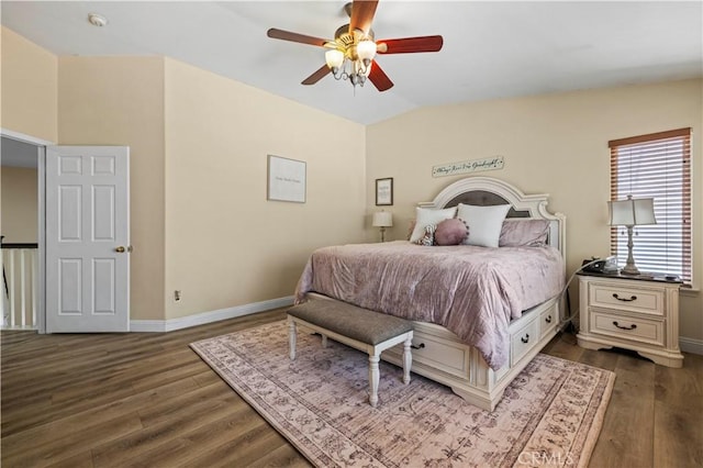 28436 Calex Dr, Valencia, CA 91354 - bedroom with dark wood finished floors, baseboards, ceiling fan, and vaulted ceiling