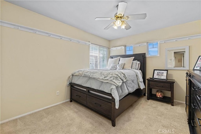 28436 Calex Dr, Valencia, CA 91354 - bedroom featuring light carpet, baseboards, and multiple windows