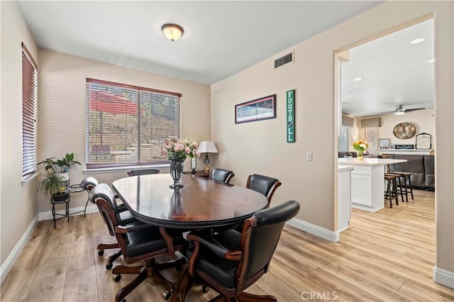 28436 Calex Dr, Valencia, CA 91354 - dining area with light wood-style flooring, plenty of natural light, and baseboards