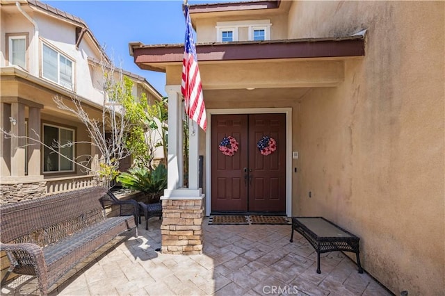 28436 Calex Dr, Valencia, CA 91354 - property entrance with stucco siding