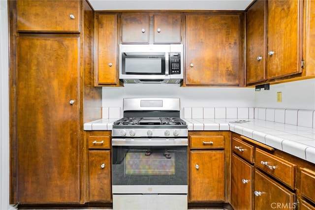 751 Santa Fe Ct, San Dimas, CA 91773 - kitchen featuring stainless steel appliances and tile counters