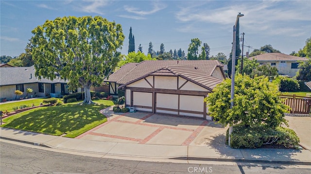 751 Santa Fe Ct, San Dimas, CA 91773 - view of front of house featuring concrete driveway, stucco siding, a front lawn, a tile roof, and a garage