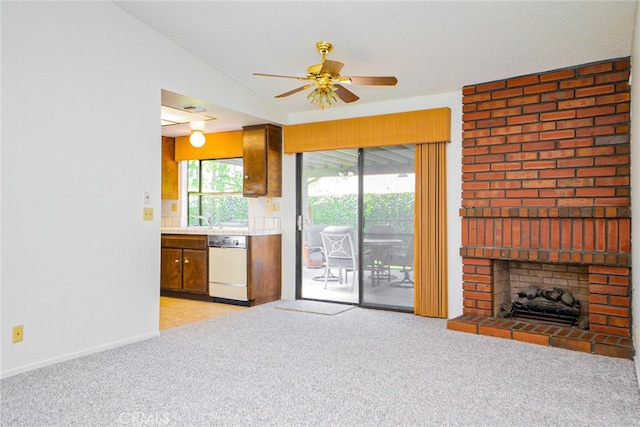 751 Santa Fe Ct, San Dimas, CA 91773 - unfurnished living room with light colored carpet, ceiling fan, a fireplace, baseboards, and a textured ceiling