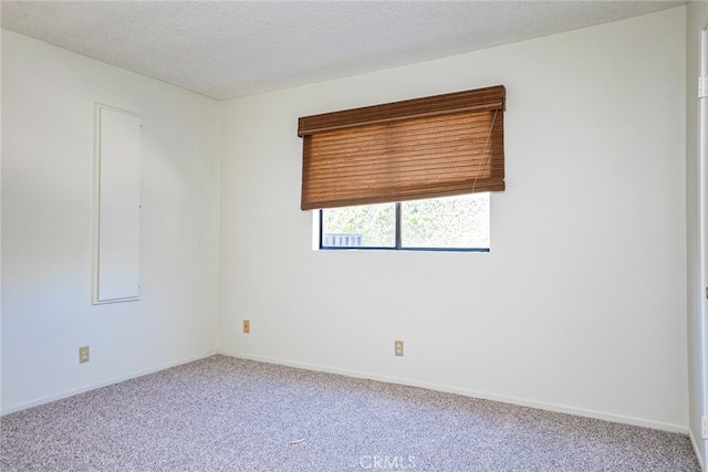 751 Santa Fe Ct, San Dimas, CA 91773 - carpeted empty room with baseboards and a textured ceiling