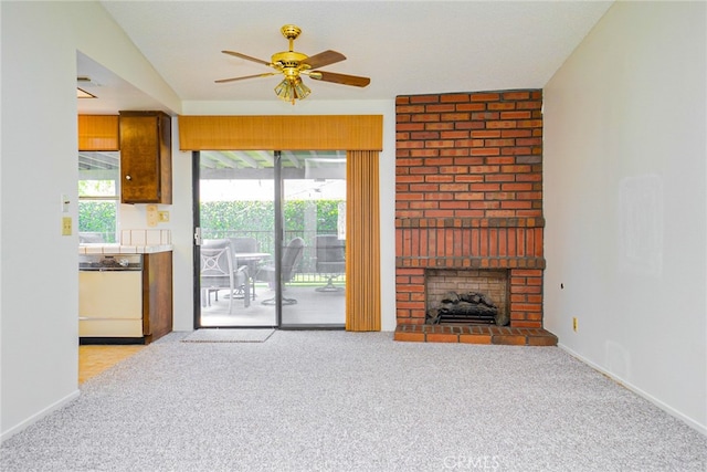 751 Santa Fe Ct, San Dimas, CA 91773 - unfurnished living room featuring a ceiling fan, light carpet, a brick fireplace, and baseboards