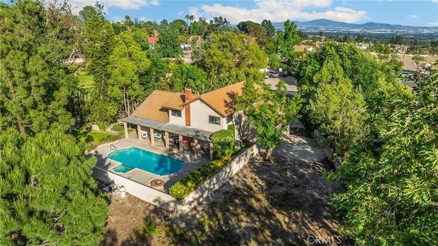 5622 Revere Ave, Rancho Cucamonga, CA 91737 - view from above of property with a pool and a mountain backdrop