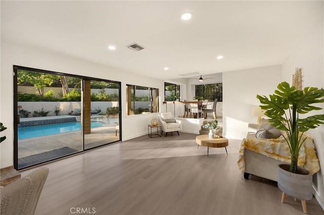 5622 Revere Ave, Rancho Cucamonga, CA 91737 - living area with wood finished floors, plenty of natural light, recessed lighting, and a ceiling fan