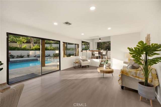 5622 Revere Ave, Rancho Cucamonga, CA 91737 - living room with wood finished floors, healthy amount of natural light, recessed lighting, and ceiling fan