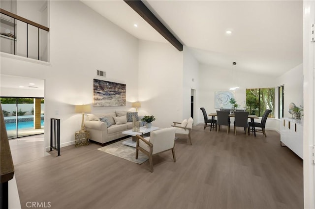 5622 Revere Ave, Rancho Cucamonga, CA 91737 - living room with plenty of natural light, wood finished floors, recessed lighting, and high vaulted ceiling