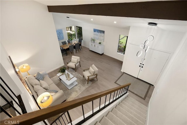 5622 Revere Ave, Rancho Cucamonga, CA 91737 - living room featuring wood finished floors, recessed lighting, and stairway
