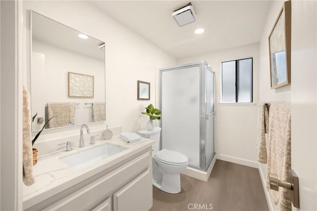 5622 Revere Ave, Rancho Cucamonga, CA 91737 - full bathroom with wood finished floors, a stall shower, vanity, and recessed lighting