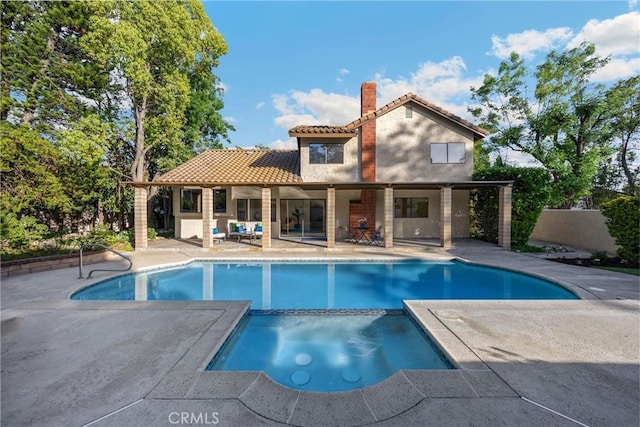 5622 Revere Ave, Rancho Cucamonga, CA 91737 - view of swimming pool with a patio area and a pool with connected hot tub