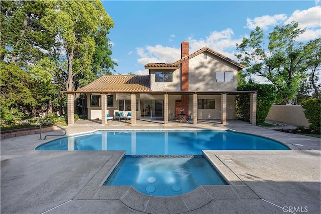 5622 Revere Ave, Rancho Cucamonga, CA 91737 - view of swimming pool with a patio and a pool with connected hot tub