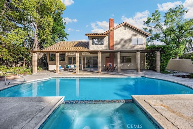 5622 Revere Ave, Rancho Cucamonga, CA 91737 - view of pool featuring a pool with connected hot tub and a patio area