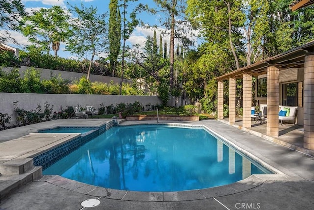 5622 Revere Ave, Rancho Cucamonga, CA 91737 - view of pool featuring a patio area, a fenced backyard, and a pool with connected hot tub