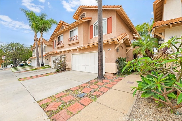 1784 Promenade Pl, Vista, CA 92083 - view of front of house with stucco siding, driveway, a garage, and a tile roof