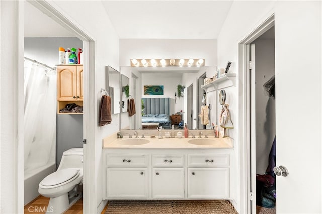 1784 Promenade Pl, Vista, CA 92083 - bathroom featuring double vanity, connected bathroom, toilet, and shower / bathtub combination with curtain