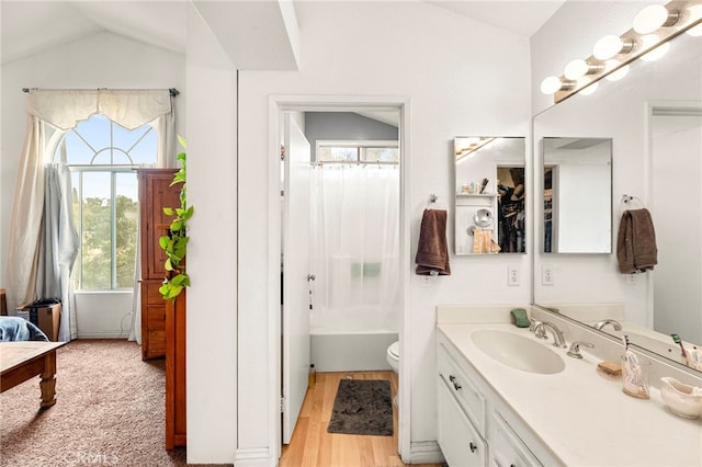 1784 Promenade Pl, Vista, CA 92083 - full bathroom featuring lofted ceiling, vanity, toilet,  shower combination, and wood finished floors