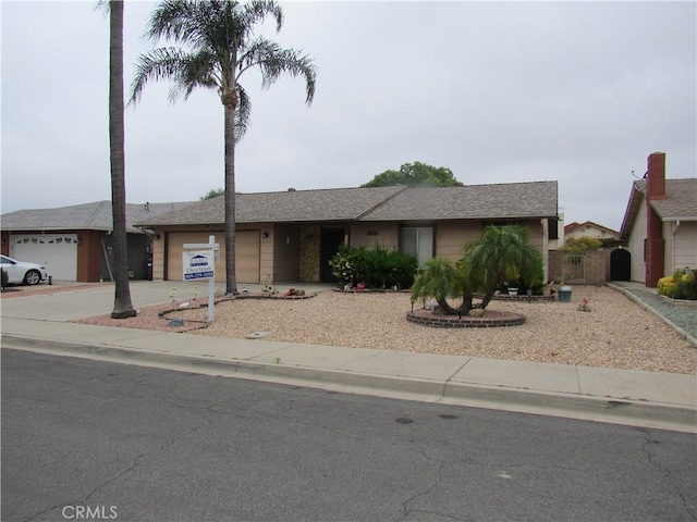 26250 Spaniel Ln, Menifee, CA 92586 - single story home featuring an attached garage and driveway