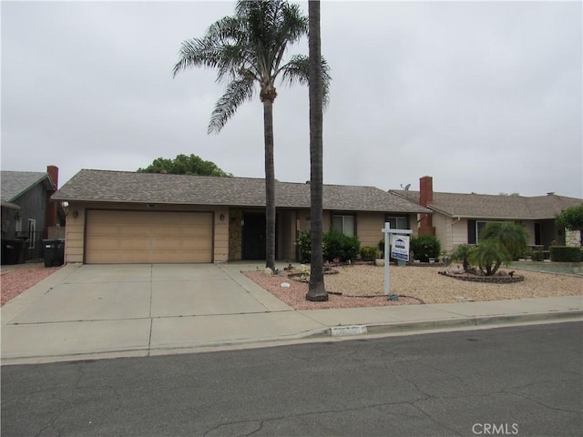 26250 Spaniel Ln, Menifee, CA 92586 - ranch-style house featuring a garage and driveway
